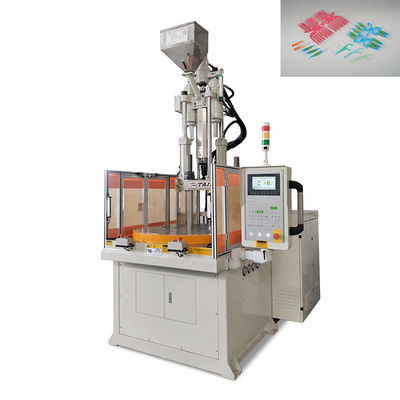 Máquina de moldeo por inyección de plástico rotativo vertical de 55 toneladas utilizada para el hilo dental