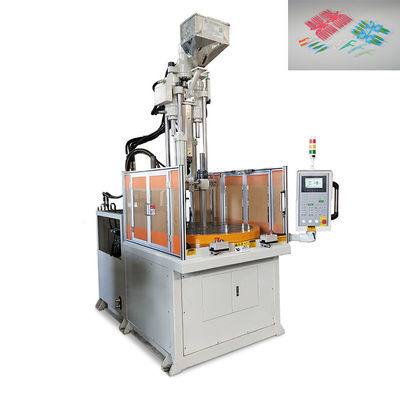 Máquina de moldeo por inyección de plástico rotativo vertical de 55 toneladas utilizada para el hilo dental