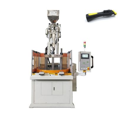 Máquina de moldeo por inyección rotativa vertical para manijas de utensilios de cocina