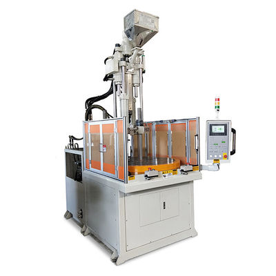 Máquina de moldeo por inyección de plástico rotativo vertical para hacer tack