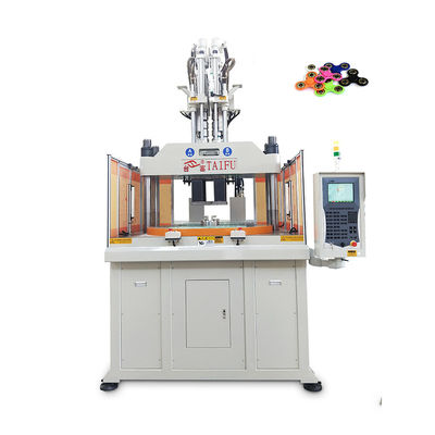 Máquina de moldeo por inyección vertical de dos colores de 120 toneladas para la fabricación de giroscopios